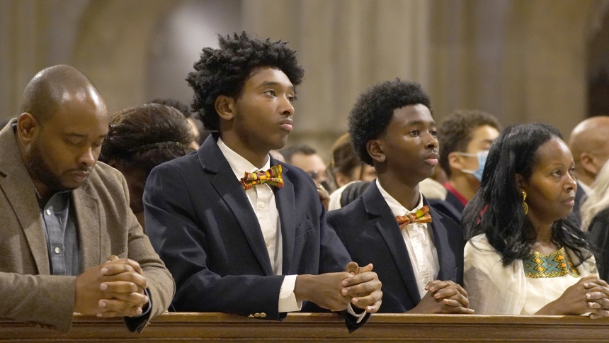 A family prays during the Archdiocese of New York's annual Black History Month Mass at St. Patrick's Cathedral in New York City Feb. 5, 2023. The liturgy also marked the National Day of Prayer for the African American and African Family. (OSV News photo/Gregory A. Shemitz)