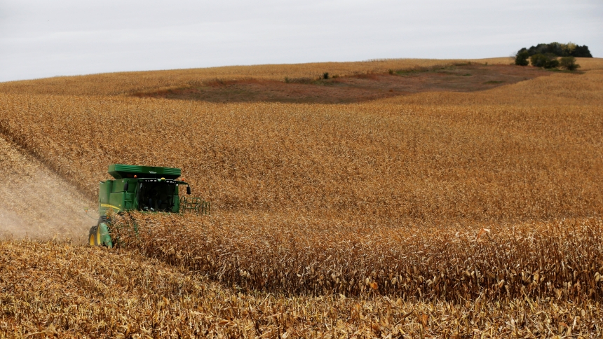 A farmer drives a combine as he harvests corn on his farm near Dixon, Neb., Oct. 26, 2017. Archbishop George J. Lucas of Omaha hosted a diverse group of leaders from government, business, education, nonprofit, agriculture and religious organizations from across northeast Nebraska for a day of reflection Aug. 17, 2024, on how to care for our common home. (OSV News photo/Lucas Jackson, Reuters)