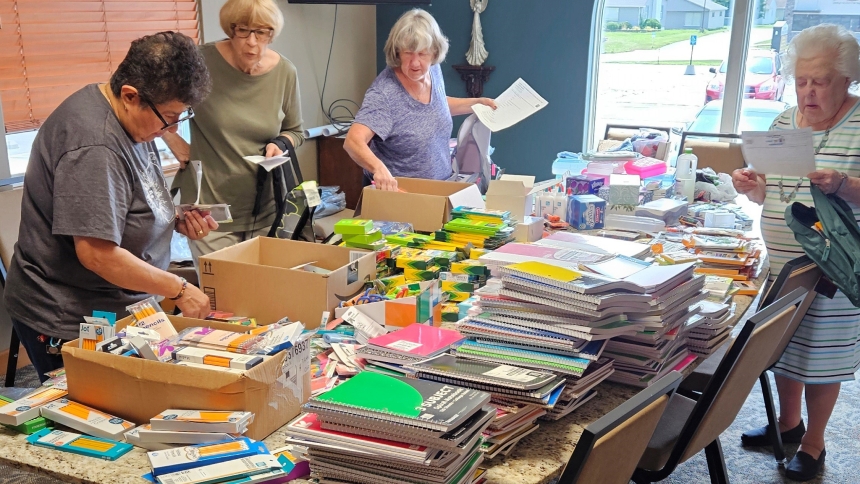 Frances Vasquez, RoseMary Vicari, Monie Wendlinger (chairperson) and Shirley Manning organize school supplies at Holy Name of Jesus in Cedar Lake. Pastoral Associate Mercedes Austgen said its parishioners are very generous in all collections for peace and social justice initiatives. The church also organizes collections that benefit the Humane Society, Mommy's Haven, Women's Care Center, and a Giving Tree for families in need at Christmastime. (Provided photo)