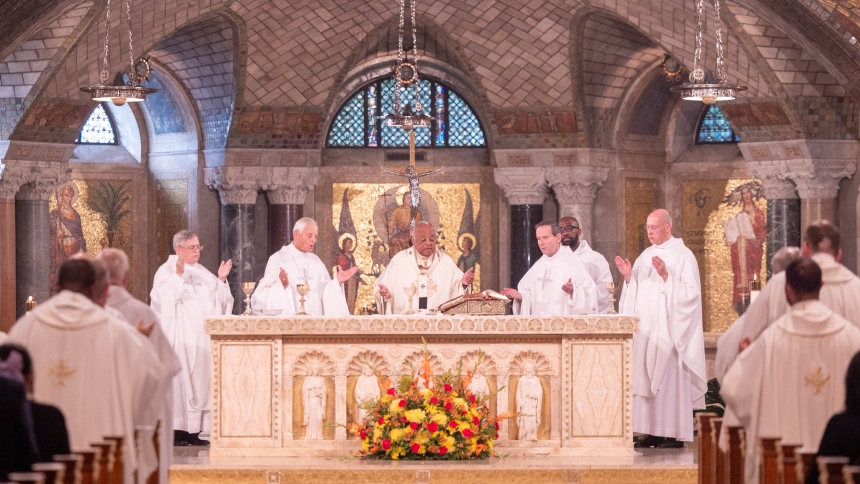 Washington Cardinal Wilton D. Gregory, at center, celebrates a Mass of thanksgiving on Aug. 22, 2024, at the Crypt Church of the Basilica of the National Shrine of the Immaculate Conception that commemorated the centennial of the first priestly ordinations at the national shrine in 1924. Since then, nearly 7,000 ordinations have taken place at the shrine. Concelebrating the Mass with Cardinal Gregory at left are Bishop Alfred A. Schlert of Allentown, Pa., and Cardinal Donald W. Wuerl, archbishop emeritus of