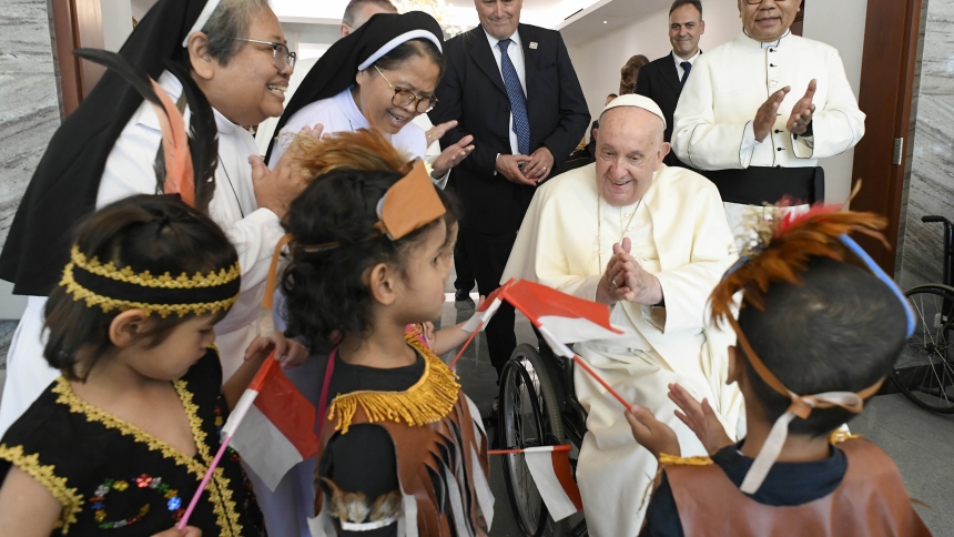 Pope Francis, a group of children who are orphaned and the Dominican sisters who care for them clap during a meeting at the apostolic nunciature in Jakarta, Indonesia, Sept. 3, 2024. The people the pope met are assisted by the Community of Sant'Egidio, the Dominican sisters and Jesuit Refugee Service. (CNS photo/Vatican Media)