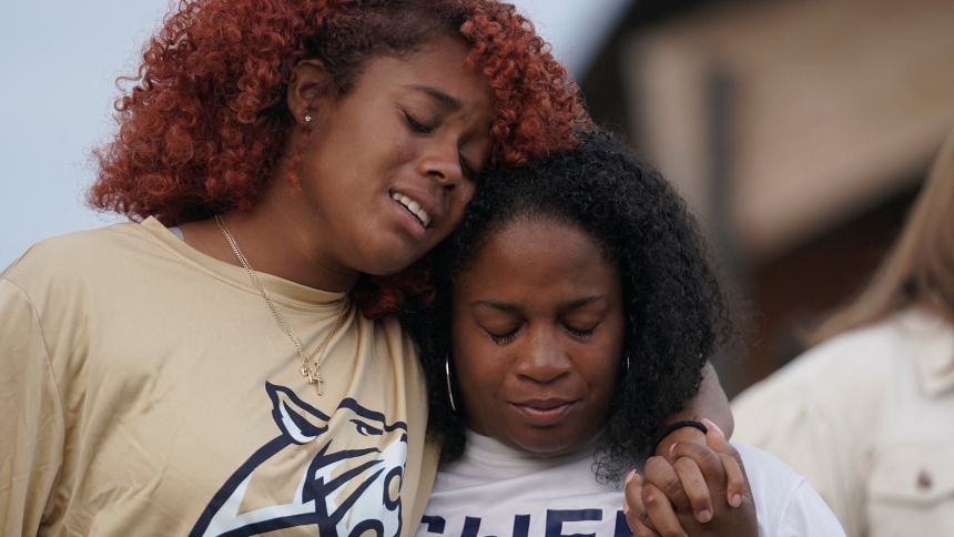 Women mourn as they attend a vigil at Jug Tavern Park in Winder, Ga., Sept. 4, 2024, following a shooting that day at Apalachee High School in Winder. A 14-year-old student opened fire at the school killing at least two teachers and two students, authorities said. (OSV News photo/Elijah Nouvelage, Reuters)