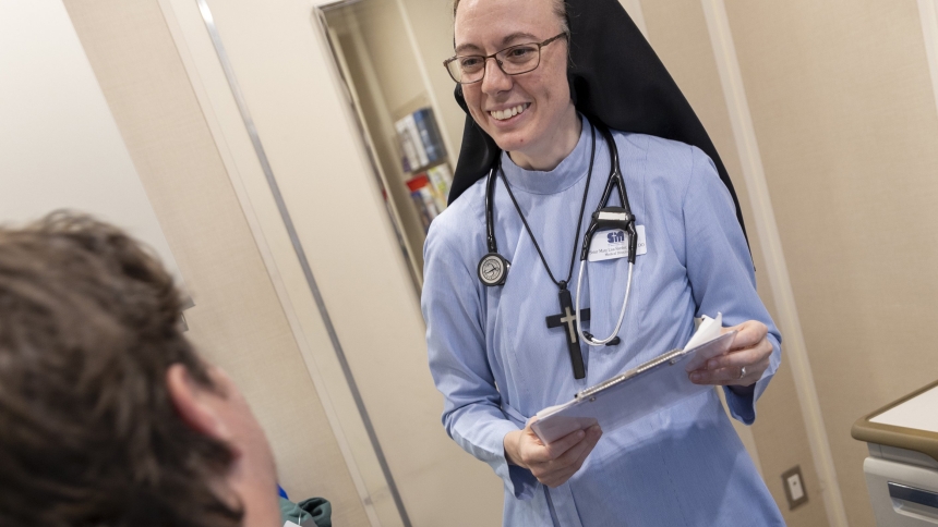 Sister Mary Lisa Renfer, who is also a physician, is seen in an undated photo interacting with a medically uninsured patient at St. Mary's Legacy Clinic in Crossville, Tenn. Sister Mary Lisa, a Religious Sister of Mercy of Alma, Mich., is the recipient of Catholic Extension Society's 2024-2025 Lumen Christi Award. The annual award, announced Sept. 20, 2024, is Extension's highest honor given "to people who radiate and reveal the light of Christ present in the communities where they serve." (OSV News photo/c