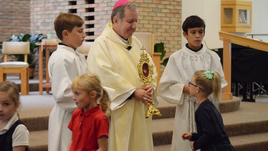 Students venerate relic at St. Patrick in Chesterton