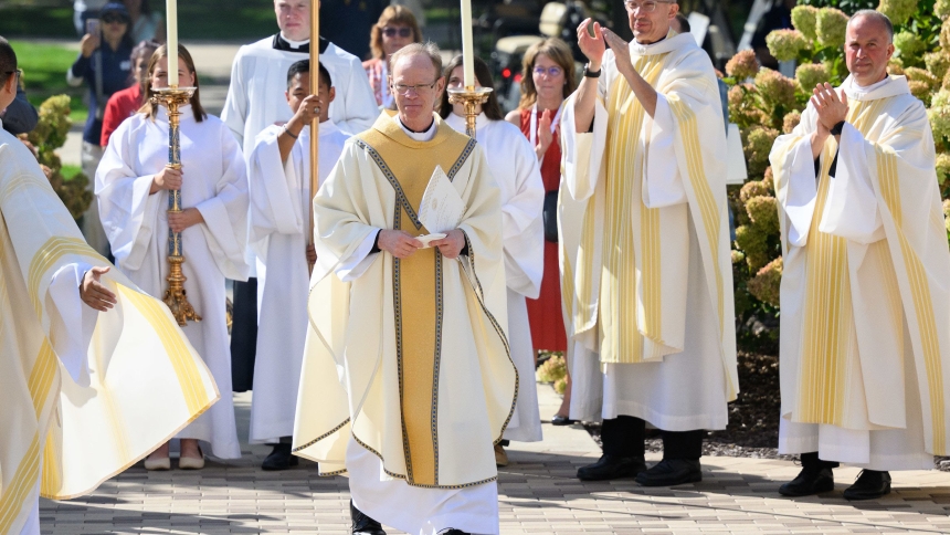 Holy Cross Father Robert A. Dowd acknowledges applause from concelebrants after the Mass celebrating his inauguration as the University of Notre Dame's 18th president in Notre Dame, Ind., on Sept. 13, 2024. (OSV News photo/Matt Cashore, University of Notre Dame)