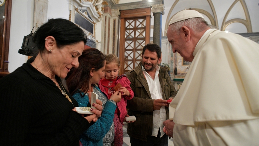 Pope Francis meets with a Roma family during a meeting with diocesan leaders, both clergy and laity, May 9, 2019, at the Basilica of St. John Lateran, the cathedral of the Diocese of Rome. (CNS photo/Vatican Media via Reuters)