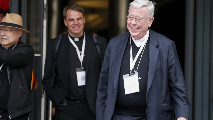 Cardnal Jean-Claude Hollerich of Luxembourg, relator general of the Synod of Bishops on synodality, exits the Paul VI Audience Hall at the Vatican after the morning session of the synod Oct. 7, 2024. (CNS photo/Robert Duncan)