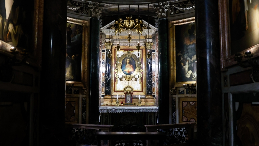 A painting by Pompeo Batoni of the Sacred Heart of Jesus from 1767 is displayed in an ornate frame inside the Jesuit Church of the Gesù in Rome, Oct. 22, 2024. (CNS photo/Lola Gomez)