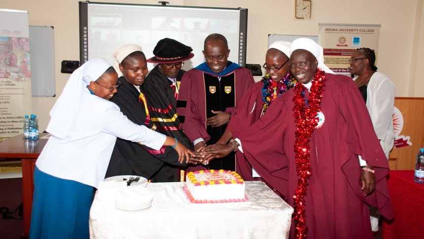 Emmanuel Sister Gladys Ndege, left, helps cut the cake to celebrate the graduates of the 2023-24 cohort for the Hilton-Hekima Sisters Scholars Program at Hekima University College in Nairobi, Kenya, in May 2024. The cohort of religious sisters had completed a one-year online certificate course in theology.(OSV News photo/courtesy of Religious Sisters Communicators' Foundation Uganda via Global Sisters Report)