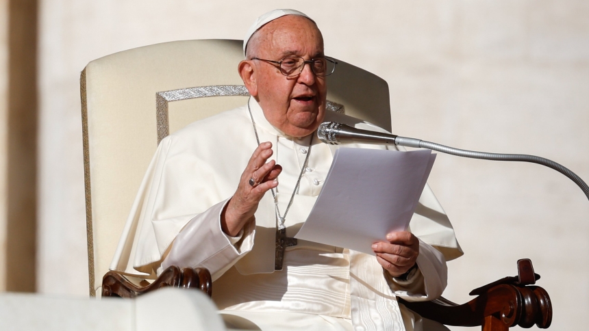 Pope Francis talks to visitors during his weekly general audience in St. Peter’s Square at the Vatican Oct. 30, 2024. (CNS photo/Lola Gomez)