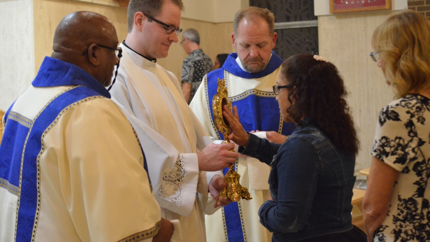 Following a service on Oct. 11 at the Carmelite Monastery in Munster which marked the end of a Eucharistic Adoration Passport initiative within the Diocese of Gary, faithful were invited to venerate a first-class relic of Blessed Carlo Acutis. Reflecting on Blessed Carlo's love of the Eucharist, Father Steven Caraher said, "Carlo knew that he wasn't looking at a what, he was looking at a who." (Erin Ciszczon photo)