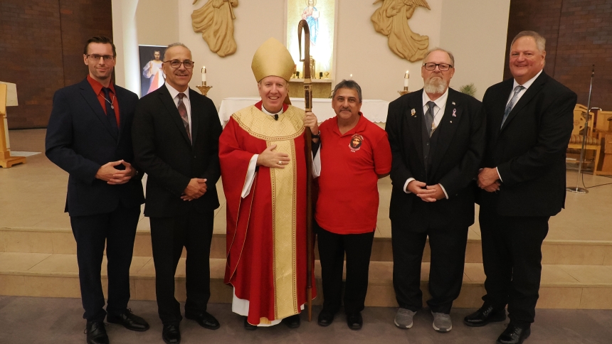 Daniel Mills, Uriel Martinez, Bishop Robert J. McClory, Manuel Eena, Bruce Garwood, and George Boby gather for a photo following the Deacon Jubilee Mass and the Rite of Admission to Candidacy for Holy Orders at Nativity of Our Savior on Sept. 26. (Deacon Bob Wellinski photo)
