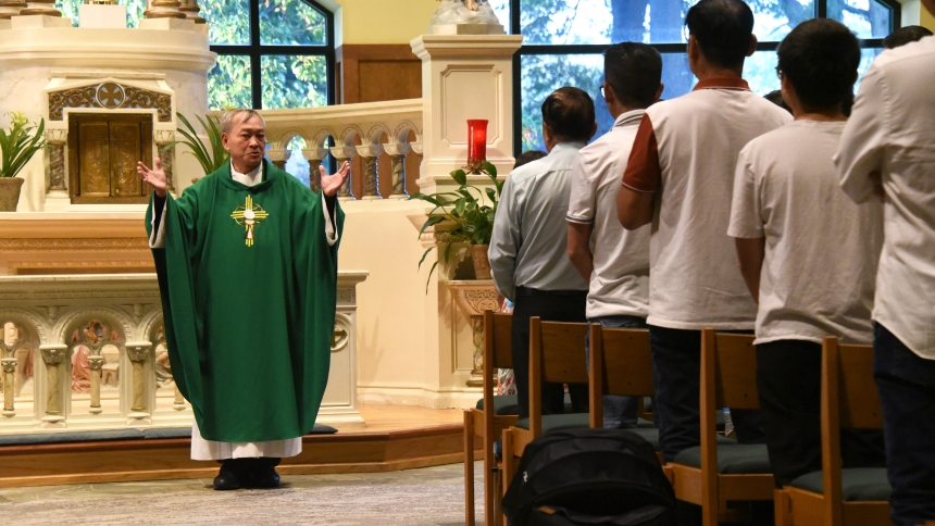 A larger than expected group of Catholics of Vietnamese background gathered for Mass in their native language, celebrated by presider Father Nhan Tran, SVD, on Sunday, Oct. 6 at St. Michael the Archangel in Schererville. The first event of its kind, sponsored by the Office of Intercultural Ministries, was seen as a hopeful sign of faithfulness among members of the Asian group residing in Northwest Indiana. (Anthony D. Alonzo photo)