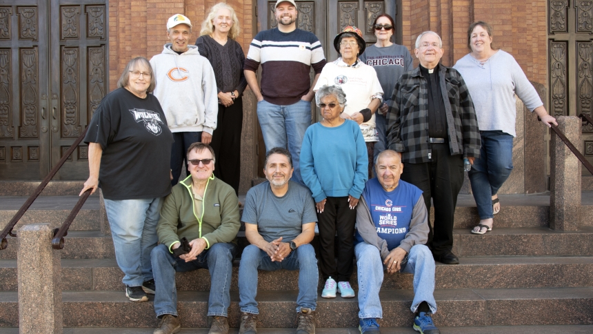 Gathered in front of St. Joseph church are part of the volunteer crew (including Deacon Duane Dedelow, bottom, right, and priest-in-residence Father Ted Nordquist, second from right) that participated in the day of service at the downtown Hammond church on Oct. 19. Parish volunteers coordinated the event, which was inspired by the diocesan day of service two months earlier, that drew more than two dozen individuals who assisted with campus maintenance and beautification. (Anthony D. Alonzo photo)