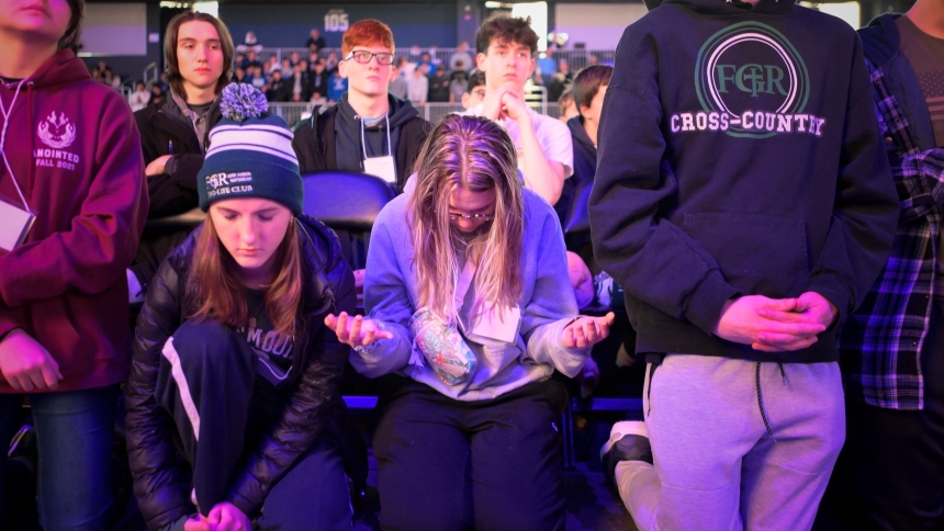 Young people pray during the first-ever Life Fest Jan. 20, 2023, at the Entertainment & Sports Arena in Washington. (OSV News photo/Jeffrey Bruno, Knights of Columbus)
