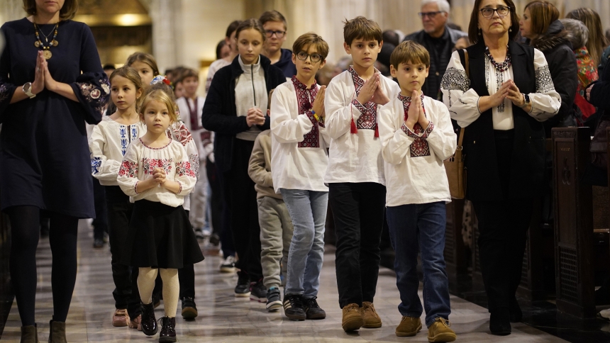 Children participate in a procession at St. Patrick's Cathedral in New York City Nov. 23, 2024, during a prayer service marking the 91st anniversary of the Holodomor, a famine engineered by Soviet dictator Josef Stalin that led to the deaths of millions of Ukrainians. (OSV News photo/Gregory A. Shemitz)