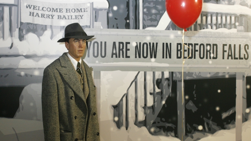 A wax figure of actor Jimmy Stewart is seen with a painted backdrop resembling a scene from "It's A Wonderful Life" at Madame Tussauds Hollywood during a press preview June 11, 2009. (OSV News photo/Fred Prouser, Reuters)