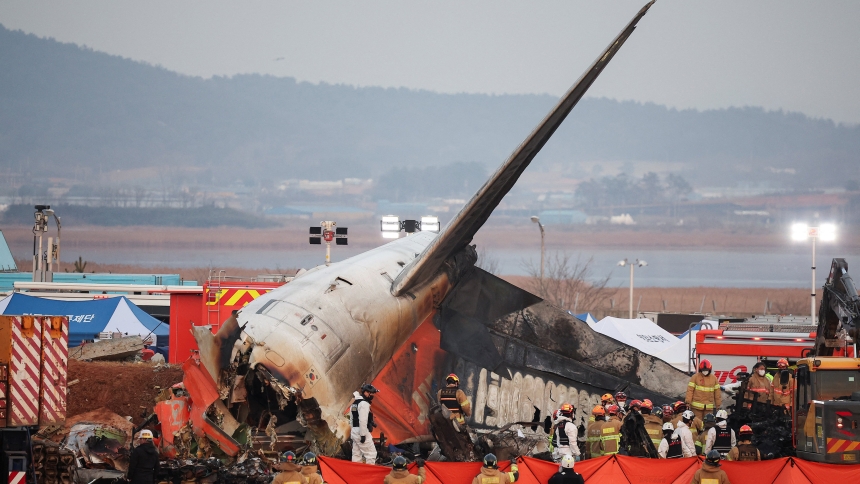 Rescue workers take part in a salvage operation at the site where an aircraft crashed after it went off the runway at Muan International Airport, in Muan, South Korea, Dec. 29, 2024. (OSV News photo/Kim Hong-Ji, Reuters)