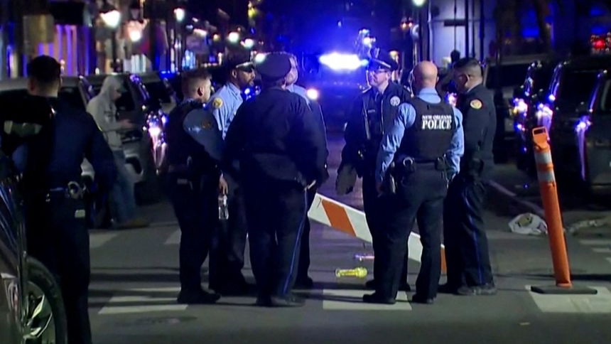 Police officers stand at the scene where a truck drove into a large crowd on Bourbon Street in the French Quarter of New Orleans Jan. 1, 2025, in this screengrab taken from a video. A driver wrought carnage on New Orleans' famed French Quarter early on New Year’s Day, ramming a pickup truck into a crowd and killing at least 15 people and injuring dozens before being shot to death by police, authorities said. (OSV News photo/ABC Affiliate WGNO/Handout via Reuters)