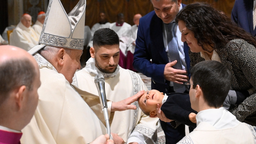 Pope Francis baptizes a baby during Mass in the Sistine Chapel at the Vatican Jan. 12, 2025, the feast of the Baptism of the Lord. (CNS photo/Vatican Media)