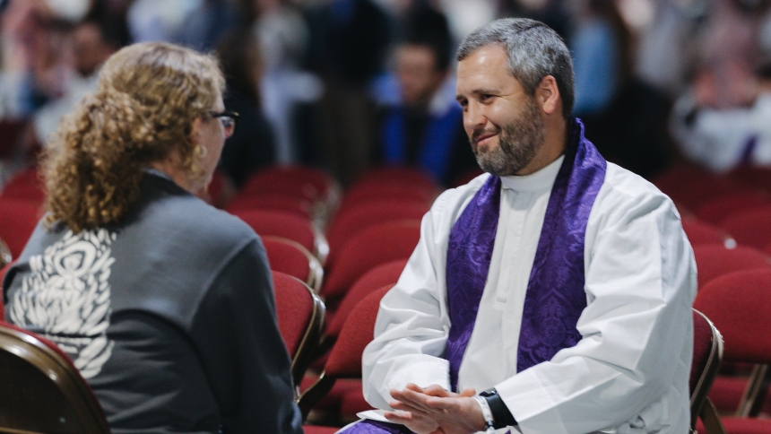 A priest offering the sacrament of reconciliation listens to a young woman at SEEK25 in Salt Lake City Jan. 3, 2025. Each year the Fellowship of Catholic University Students, known as FOCUS, holds the annual SEEK conference to bring together thousands of its campus missionaries and college students from across the nation. For 2025, it was held Jan. 1-5 in Salt Lake City and Jan. 2-5 in Washington. (OSV News photo/courtesy FOCUS)