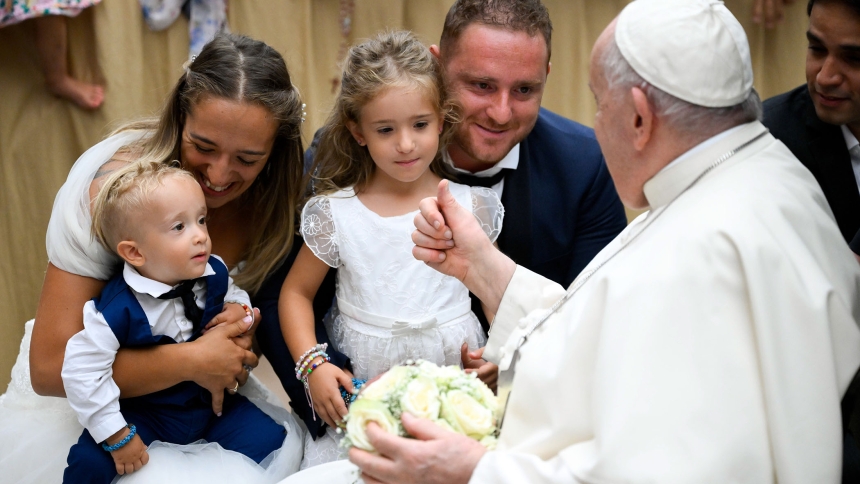 Pope Francis greets a married couple and their children at the end of his weekly general audience in the Paul VI Audience Hall at the Vatican Aug. 30, 2023. In 2025, National Marriage Week USA is celebrated Feb. 7-14 and World Marriage Day, which is commemorated on the second Sunday of February, is celebrated Feb. 9. (CNS photo/Vatican Media)