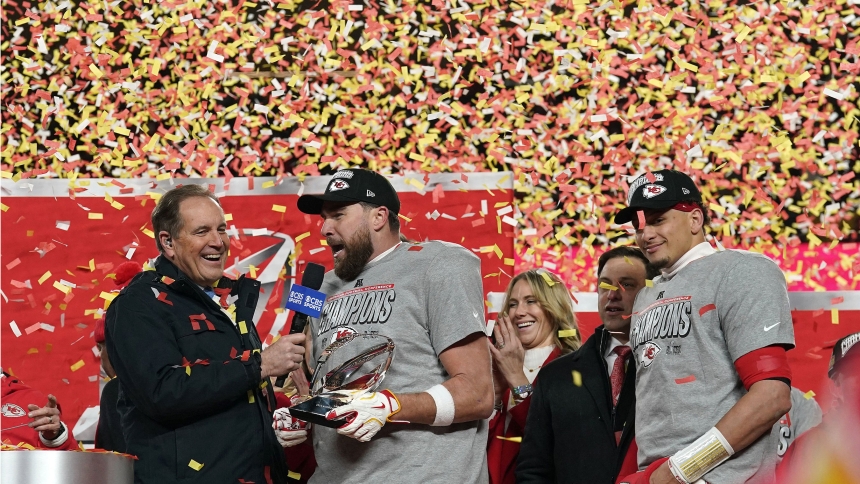 Kansas City Chiefs tight end Travis Kelce (87) speaks to the media after being presented with the Lamar Hunt Trophy after the AFC Championship game against the Buffalo Bills at GEHA Field at Arrowhead Stadium Jan. 26. (OSV News photo/Eric Hartline-Imagn Images and Denny Medley-Imagn Images)