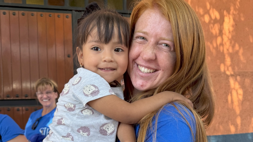 Katherine Carlson, a staff member at St. John the Evangelist in St. John on a 2024 mission trip, interacts a young girl who was taken off the streets of Mexico City through the ministry and work of Hope of the Poor. Carlson will return with a group of up to 40 on a Diocese of Gary mission trip in September. (Provided photo)