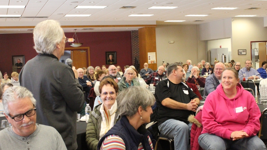 Speaker Father Jerry Schweitzer had the perfect one-liner for a clever listener who asked him, "What is the meaning of life?" during a Pre-Lenten Retreat on Feb. 22 at Holy Spirit in Winfield. His answer likely resulted in a smile from God above. (Marlene A. Zloza photo)