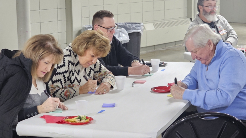 Participants write down asset ideas during St. Stanislaus Kostka Parish’s asset-mapping event on Jan. 23. (Deacon Bob Wellinski photo)