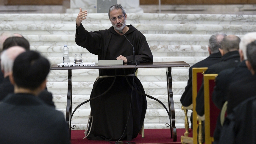 Capuchin Father Roberto Pasolini, preacher of the papal household, leads a meditation during a Lenten retreat for cardinals and senior officials of the Roman Curia in the Paul VI Audience Hall at the Vatican March 14, 2025. (CNS photo/Vatican Media)