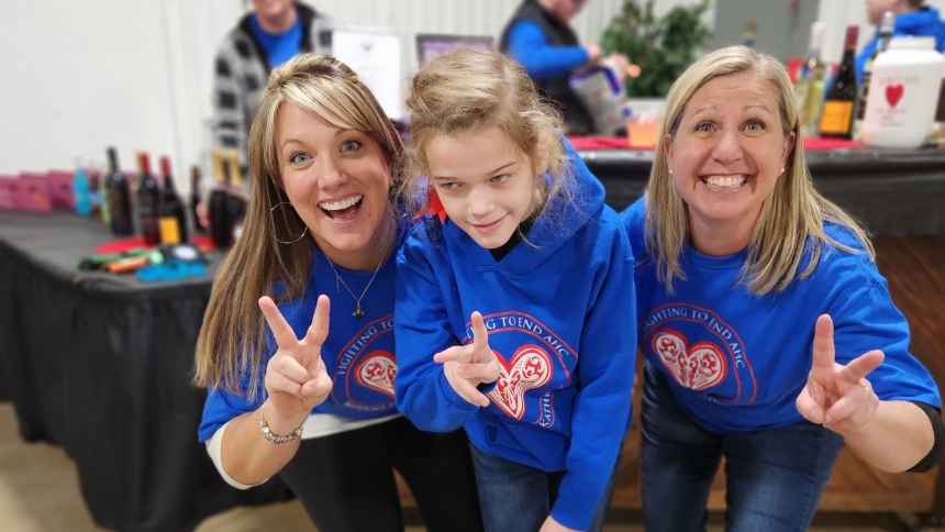 Elizabeth Hauger, left, Kathryn Marszalek and Carrie Pfeiffer give the peace sign during the Warriors for Kathryn event Feb. 3, 2023. (OSV News photo/Handout)