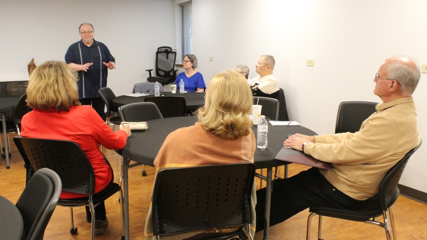 Deacon Matt Virus addresses Marriage and Family Life ministers at a meeting hosted by the Diocese of Gary on March 13 at the Pastoral Center as he and his wife, Millie Virus (to his left), who works in the diocesan tribunal, talked about problems in marriages and how to strengthen couples. (Marlene A. Zloza photo)
