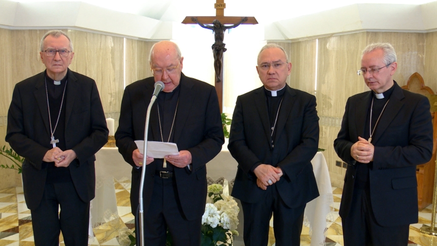 Cardinal Kevin Farrell, "camerlengo" or chamberlain of the Holy Roman Church, announced the death of Pope Francis from the Domus Sanctae Marthae, where the pope lived, at the Vatican April 21, 2025. Standing with him are Cardinal Pietro Parolin, Vatican secretary of state; Archbishop Edgar Peña Parra, substitute for general affairs of the Secretariat of State; and Archbishop Diego Ravelli, master of papal liturgical ceremonies. (CNS photo/Vatican Media)