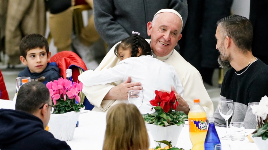 Pope Francis hugs girl