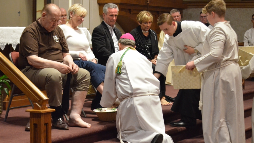 Bishop Robert J. McClory celebrated the Mass of the Lord's Supper with parishioners at St. Mary in Crown Point. Also known as the Maundy Thursday service, the special liturgy commemorates the Last Supper of Jesus with his disciples and highlights the institution of the Eucharist. Foot washing, symbolizing Jesus' humility, is done as an example of Christian service to one another. (Erin Ciszczon photo)