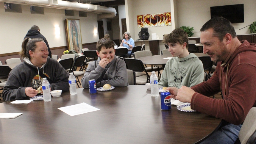 Enjoying fellowship and some delicious soup at the Soup and Bread Social on April 2 at Holy Name of Jesus in Cedar Lake are St. John residents (from left) Denise Webb and her son Alex Webb, parishioners, and Tyler Rybicki and his father, Dave Rybicki, parishioners at St. Thomas More in Munster. The simple meal was followed by the fourth and final parish renewal session on gratitude, which the young men attended as a Generations of Faith confirmation class assignment at Holy Name. (Marlene A. Zloza photo) 