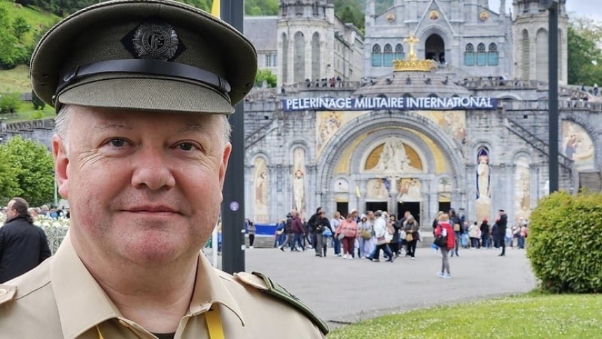 Father Paul Murphy is pictured in the Sanctuary of Our Lady of Lourdes in France during the annual military pilgrimage to the French shrine on an undated photograph. In a powerful courtroom moment just before Holy Week, Irish Army chaplain Fath Murphy forgave the radicalized teenager who tried to kill him in a 2024 knife attack. (OSV News photo/courtesy Irish Defence Forces)