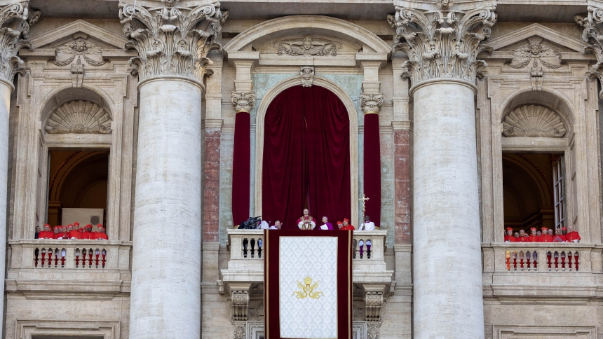 Pope Leo XIV, the former Cardinal Robert F. Prevost, waves to the crowds in St. Peter's Square at the Vatican after his election as pope May 8, 2025. The new pope was born in Chicago. (CNS photo/Pablo Esparza)