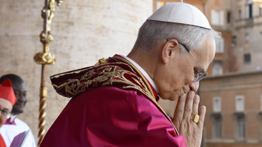 Pope Leo XIV, the former Cardinal Robert F. Prevost, waves to the crowds in St. Peter's Square at the Vatican after his election as pope May 8, 2025. The new pope was born in Chicago. (CNS photo/Vatican Media)