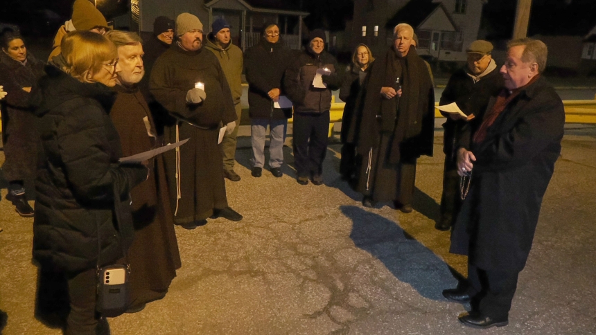 Bishop Robert J. McClory (right) and Father Rick Holy, director of pro-life activities for the Diocese of Gary, lead a group in the rosary followed by a prayer vigil outside Indiana State Prison, Michigan City prior to the execution of Joseph Corcoran, 49, on Dec. 17, 2024. (Deacon Bob Wellinski photo)