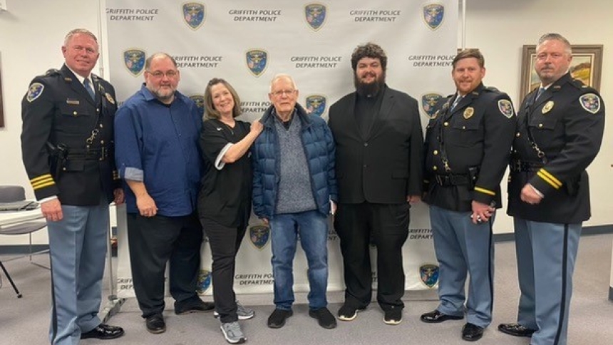 Pictured in this group photo are Griffith Chief of Police Greg Mance (now retired), Pastor Bill Jones of the United Methodist Church, Marlene Starcevich, Father Theodore Mens, Father Greg Bim-Merle, Lt. Paul Sines and Commander Curt Burrow also of the Griffith Police Department.