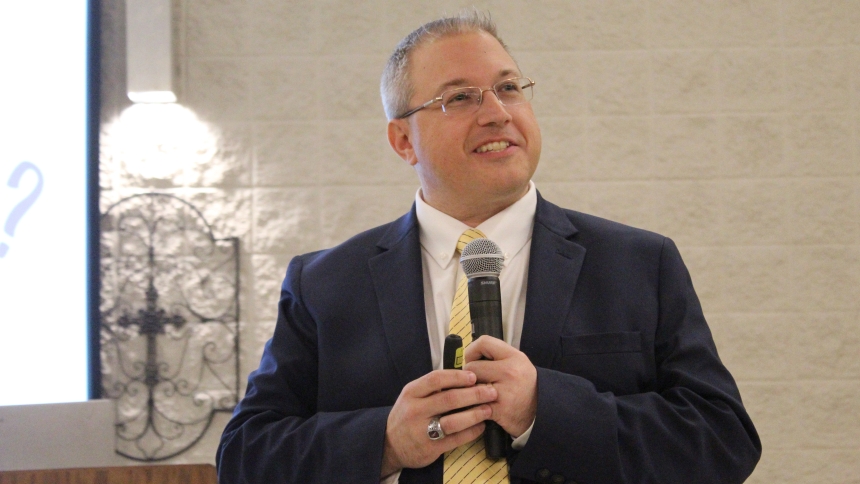 Paul Jarzembowski, a Dyer native currently working for the U.S. Conference of Catholic Bishops in Washington, D.C.,  offers some ways to reduce stress during the hectic holiday season, straight from his new book, "Hope for the Holidays." He spoke to more than 100 people at a dinner program on Nov. 19, 2023 at Our Lady of Consolation in Merrillville. (Marlene A. Zloza phoio)