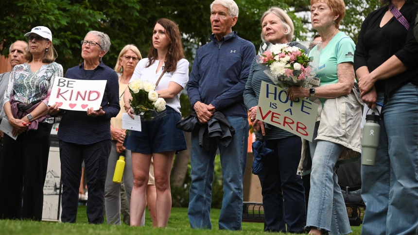 People gather for a prayer vigil in Boulder, Colo., June 2, 2025, beside a makeshift memorial at the scene of an attack that injured multiple people outside the Boulder County Courthouse. The alleged attacker, identified by the FBI as 45-year-old Mohamed Sabry Soliman, was armed with a homemade flamethrower and threw two Molotov cocktails at the group June 1, burning multiple victims, police said. Witnesses said Soliman yelled, "Free Palestine." (OSV News photo/Mark Makela, Reuters)