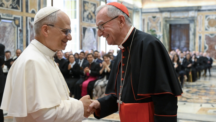 Pope Leo XIV shakes hands with Cardinal Pietro Parolin, Vatican secretary of state, during an audience at the Vatican with officials from the Secretariat of State June 5, 2025. (CNS photo/Vatican Media)