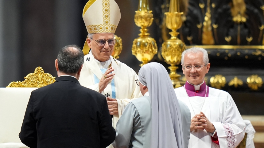 Pope Leo XIV receives the offertory gifts during Mass for the Jubilee of the Holy See in St. Peter’s Basilica at the Vatican June 9, 2025. (CNS photo/Lola Gomez)