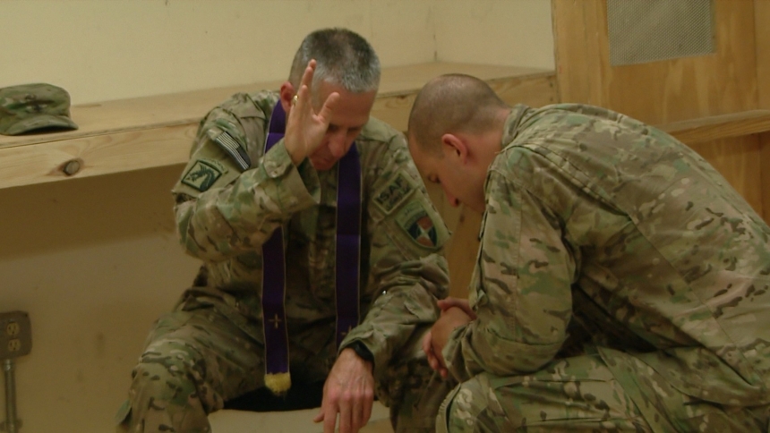 Father Paul K. Hurley, then-U.S. Army chaplain, is pictured in a 2014 photo giving a blessing for deployed U.S. military personnel in Afghanistan. (OSV News photo/courtesy Journey Films)