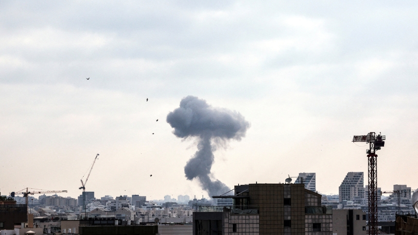 Smoke can be seen during a missile attack from Iran on Israel, amid the Iran-Israel conflict, in Tel Aviv, Israel, June 22, 2025. (OSV News photo/Violeta Santos Moura, Reuters)