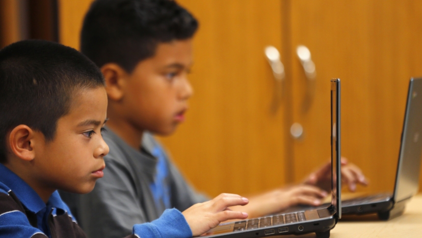 Fourth-grade students are pictured in a file photo working on laptop computers at Monarch School in San Diego. An analysis from Pew Research Center published June 23, 2025, showed 57% of U.S. adults say they favor allowing public school teachers to lead their classes in prayers referencing God, while 52% support teachers leading prayers "that refer to Jesus." (OSV News photo/Mike Blake, Reuters)