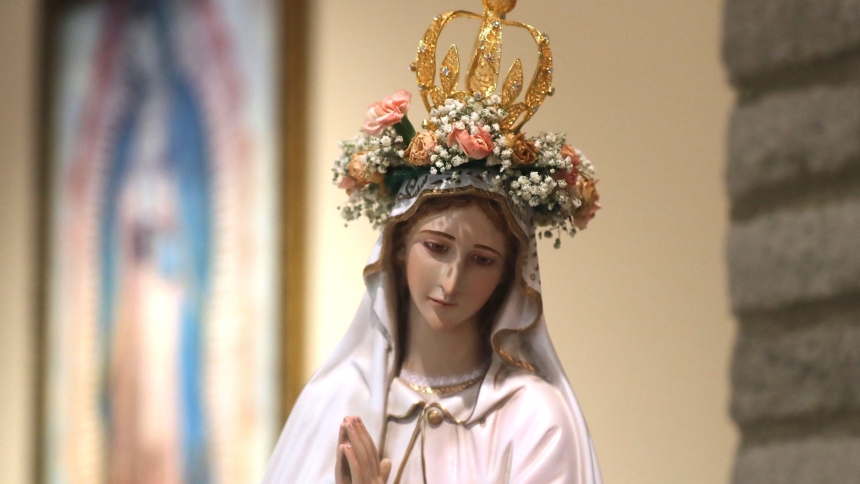 A statue of Mary with a crown, and a painting of Our Lady of Guadalupe are pictured at Sacred Heart Church in Prescott, Ariz., May 5, 2025. The month of May is devoted to Mary and is traditionally celebrated with a crowning and praying of the rosary. (OSV News photo/Bob Roller)